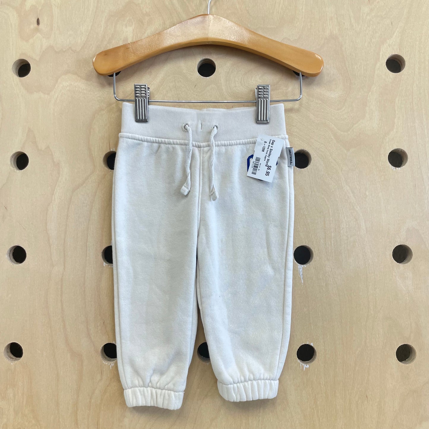 Cream Winky Emoji Joggers