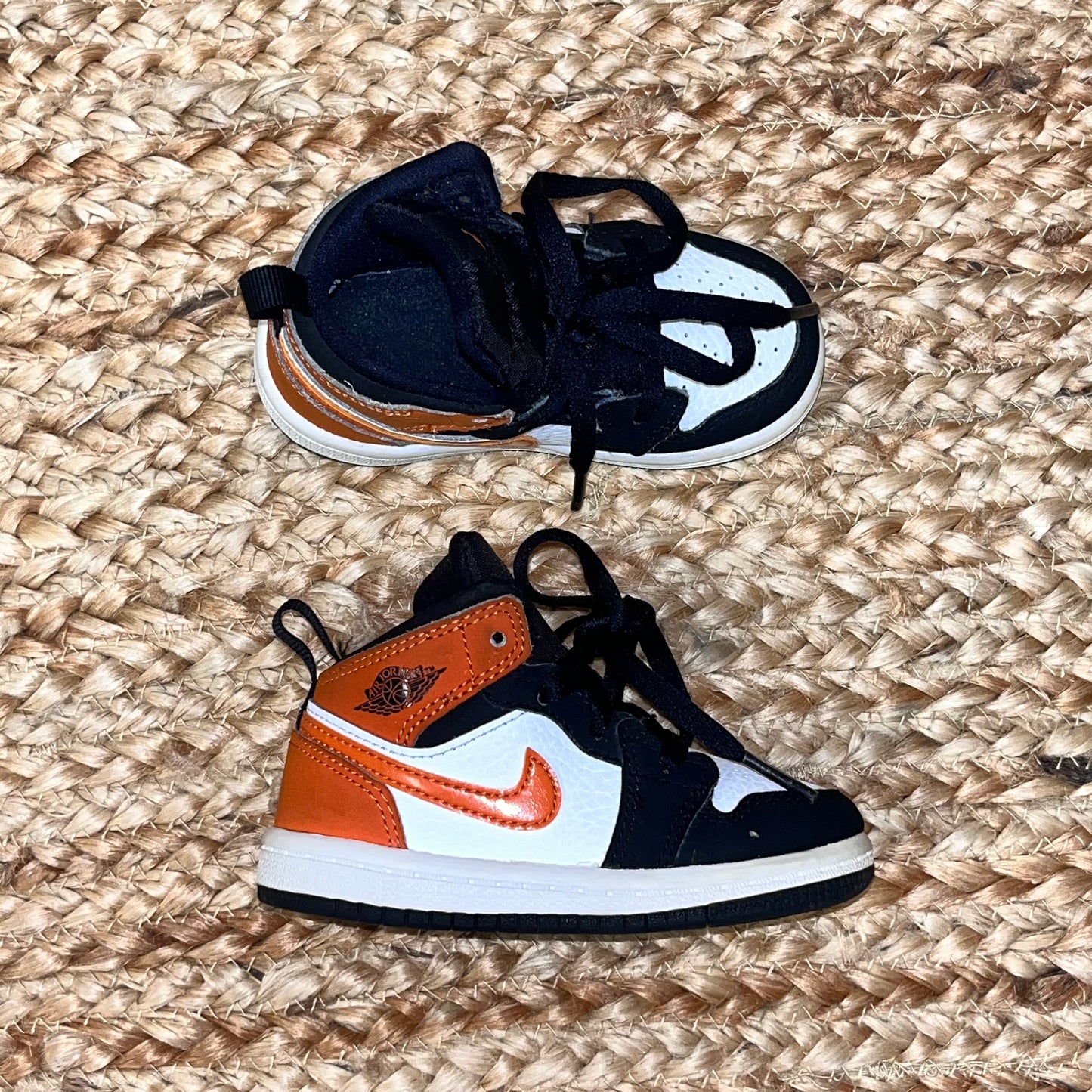Orange/Black Air Jordan 1 Mid Sneakers