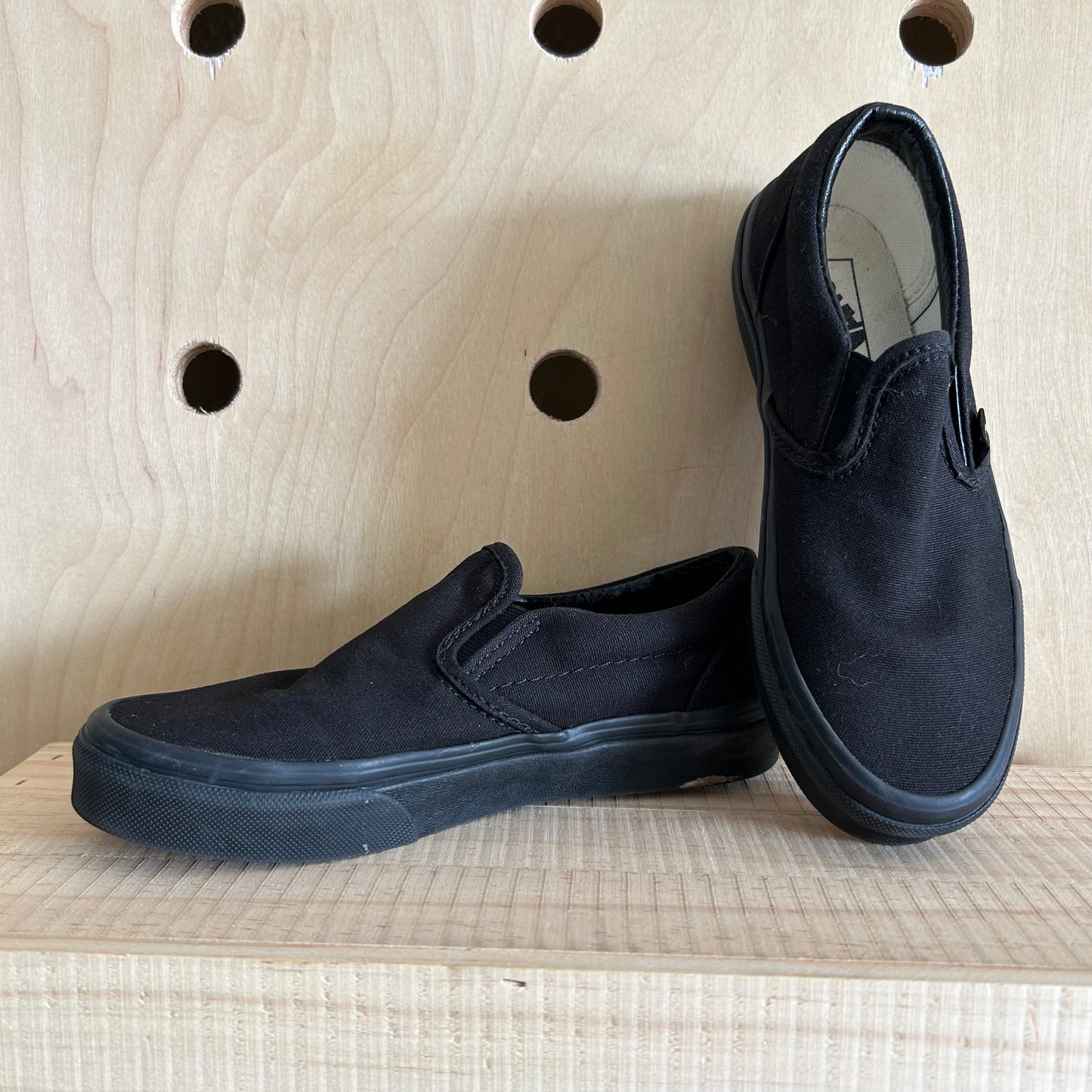 Black Low Top Slip Ons