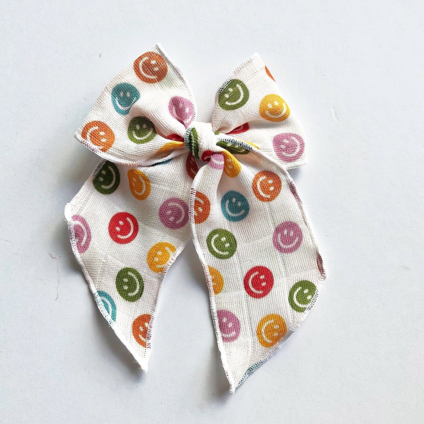 Rainbow Smiley Clip Bow