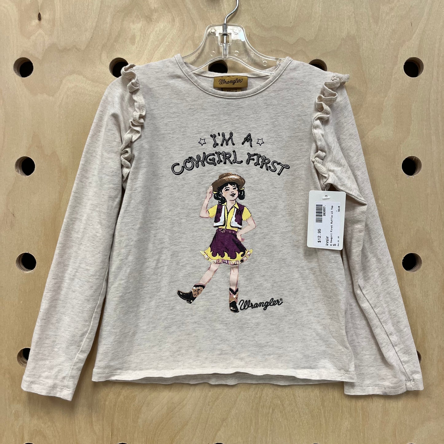 A Cowgirl First Ruffle LS Top