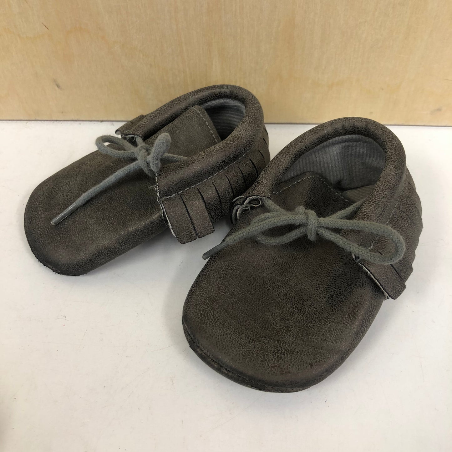 Grey Fringe Moccs
