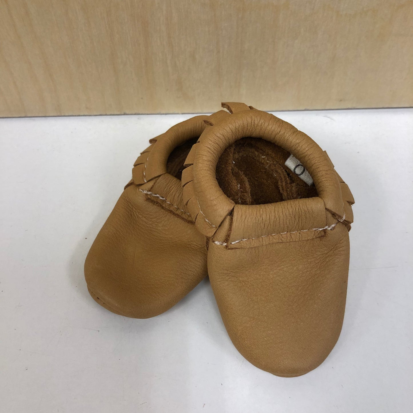 Tan Fringe Leather Moccs