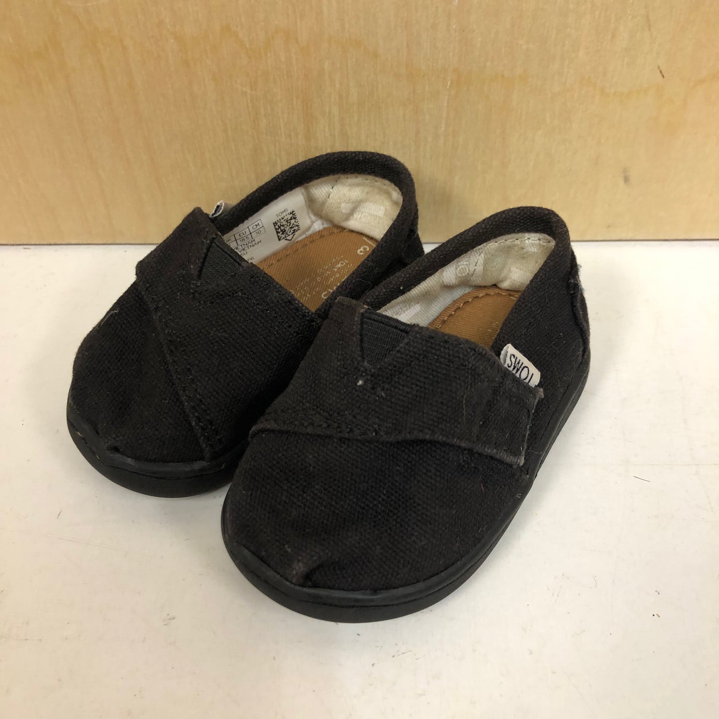 Black Canvas Slip Ons