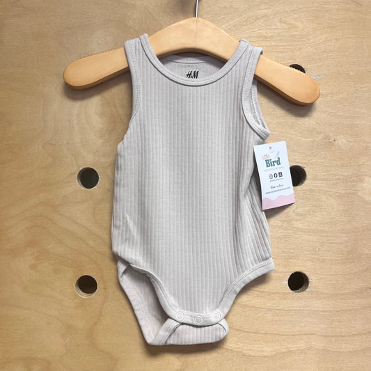 Organic White Ribbed Bodysuit