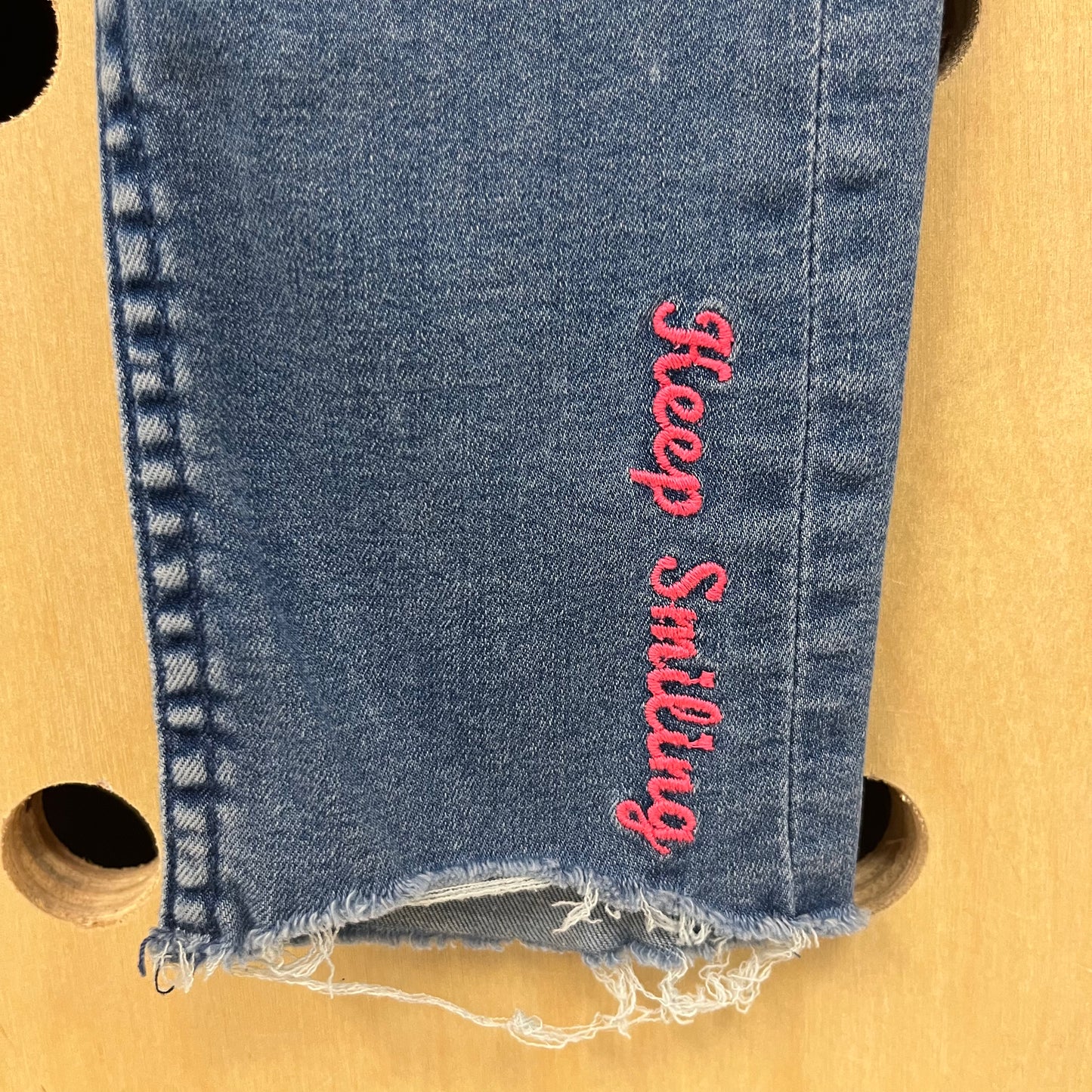 Keep Smiling Raw Hem Denim