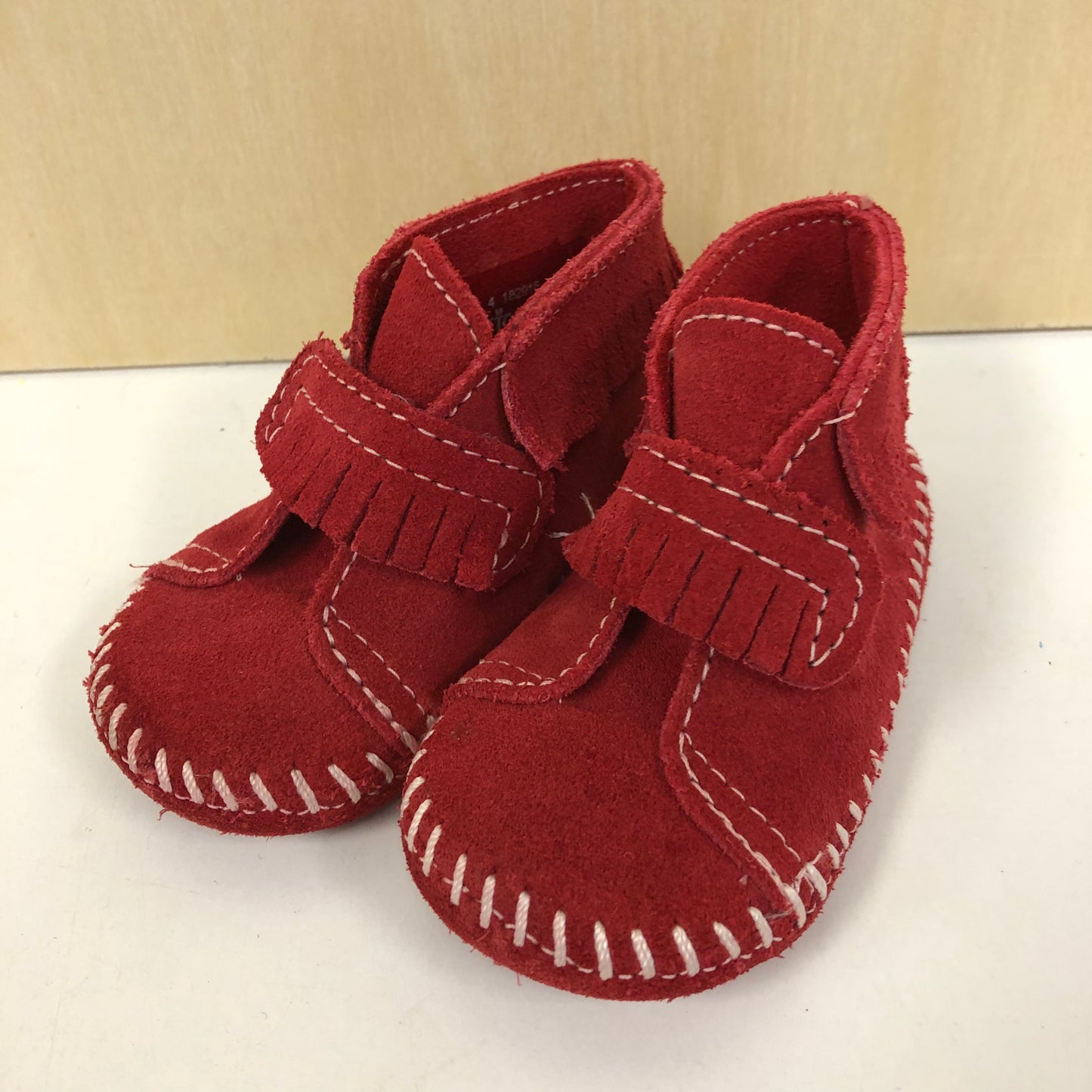 Red Fringe Moccs
