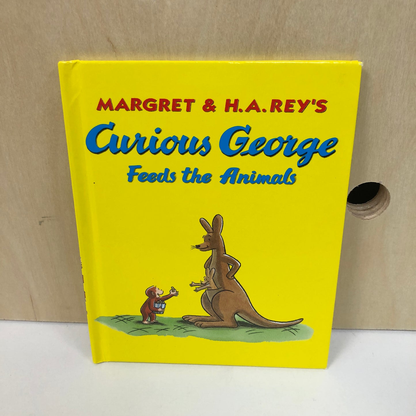 Curious George Feeds Animals